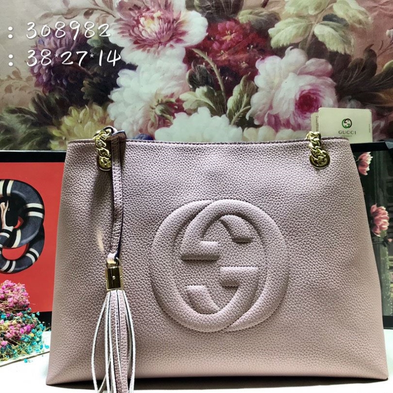 G*u*i shopping bags